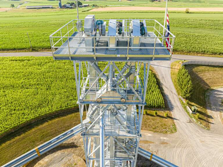 Aerial view of a field with farming equipment